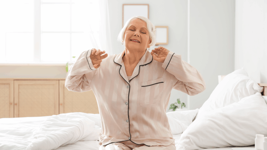 old woman stretching in bed