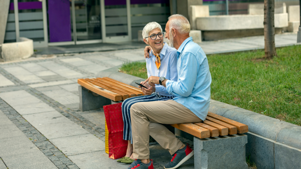 old couple sitting in the park